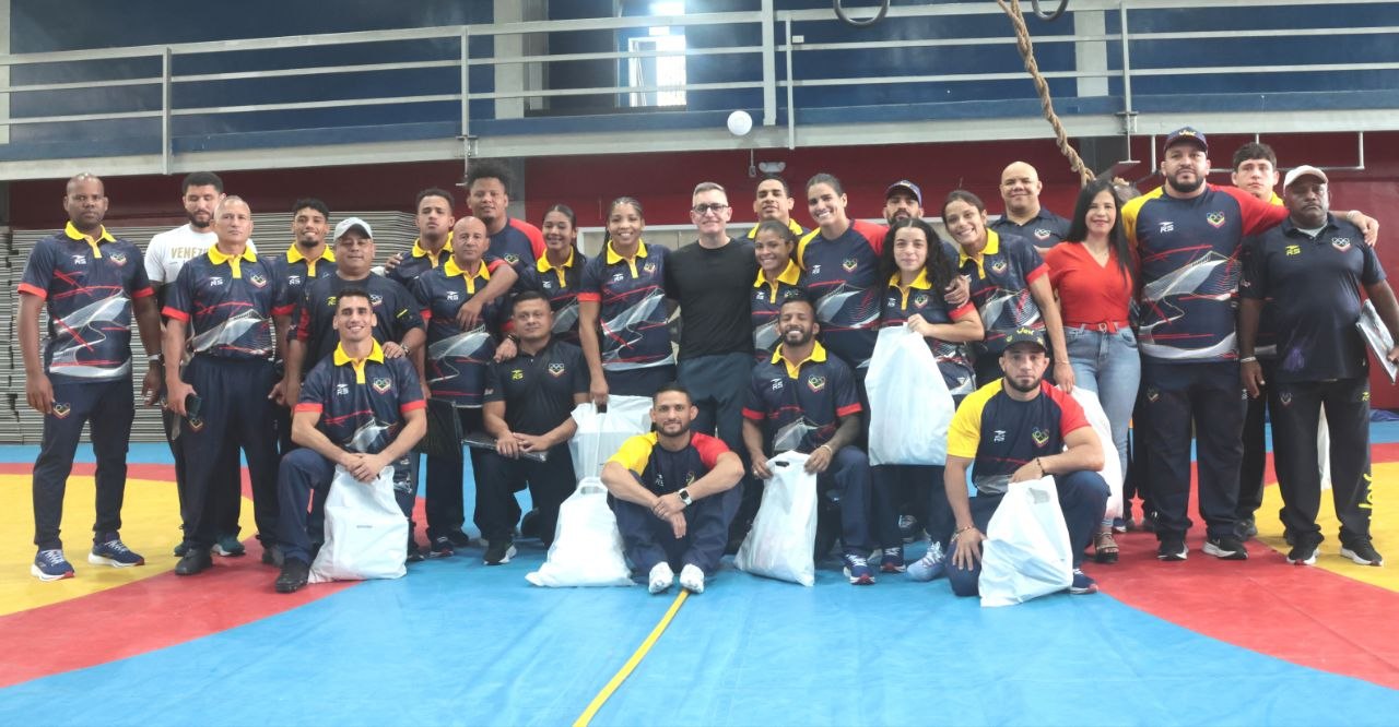 Lucha olímpica equipada para la victoria